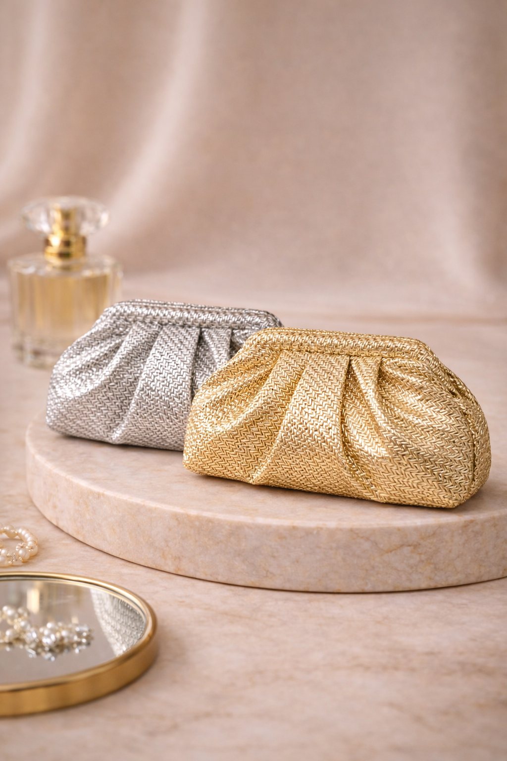 Aurelia Metallic Clutch Bag | Puffed Sculpted Evening Clutch in silver Mini – ORAYA